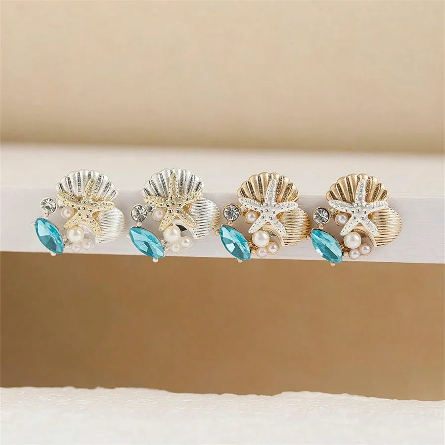 1 Pair Simple Style Classic Style Starfish Inlay Zinc Alloy Pearl Zircon 14K Gold Plated Ear Studs