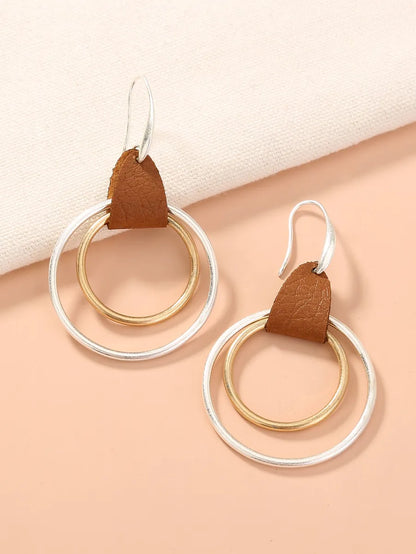 1 Pair Simple Style Commute Color Block Irregular Hollow Out Pu Leather Drop Earrings