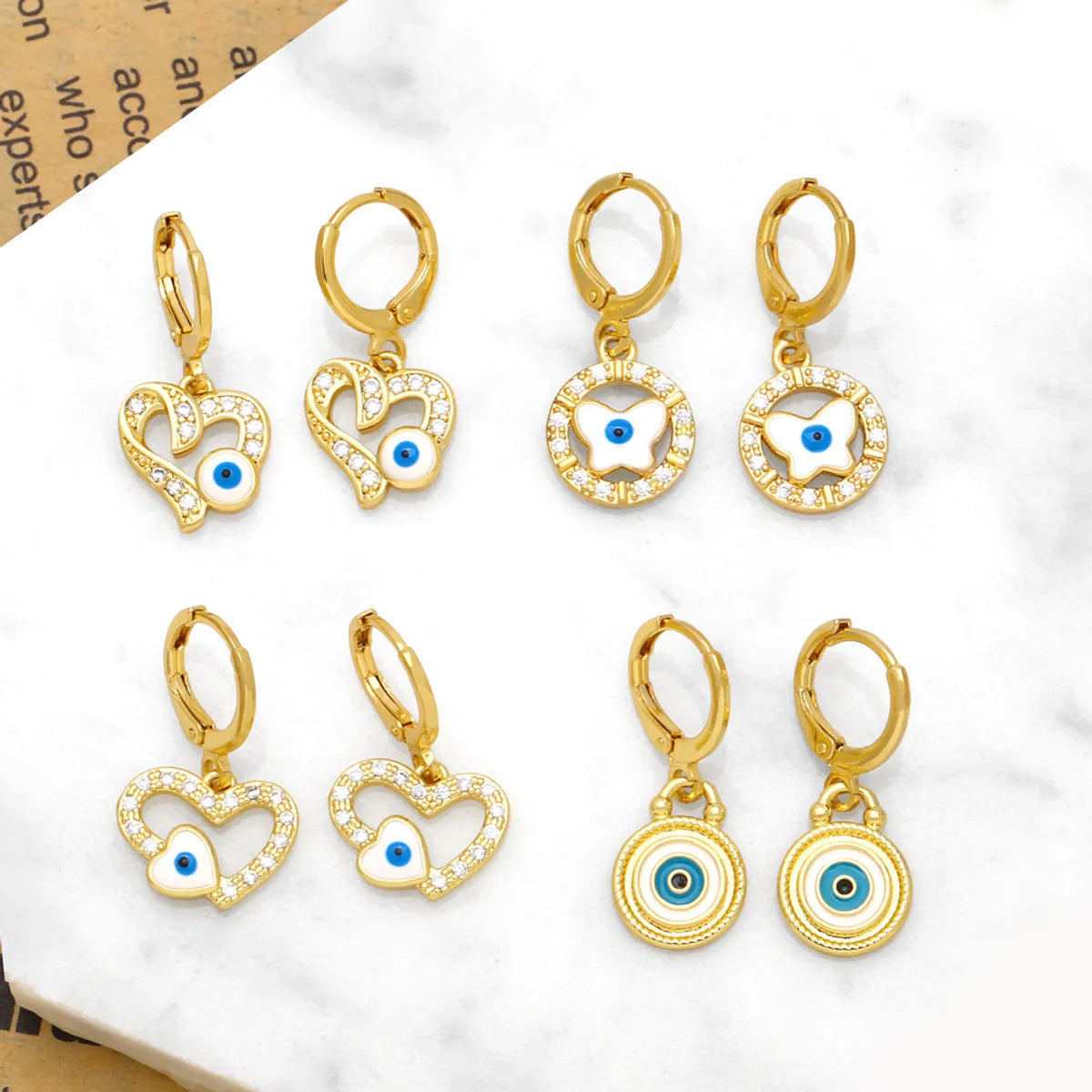 1 Pair Simple Style Commute Devil's Eye Heart Shape Butterfly Plating Inlay Copper Zircon 18k Gold Plated Drop Earrings