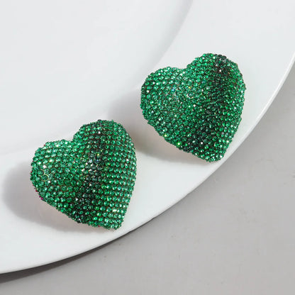 1 Pair Simple Style Heart Shape Alloy Ear Studs