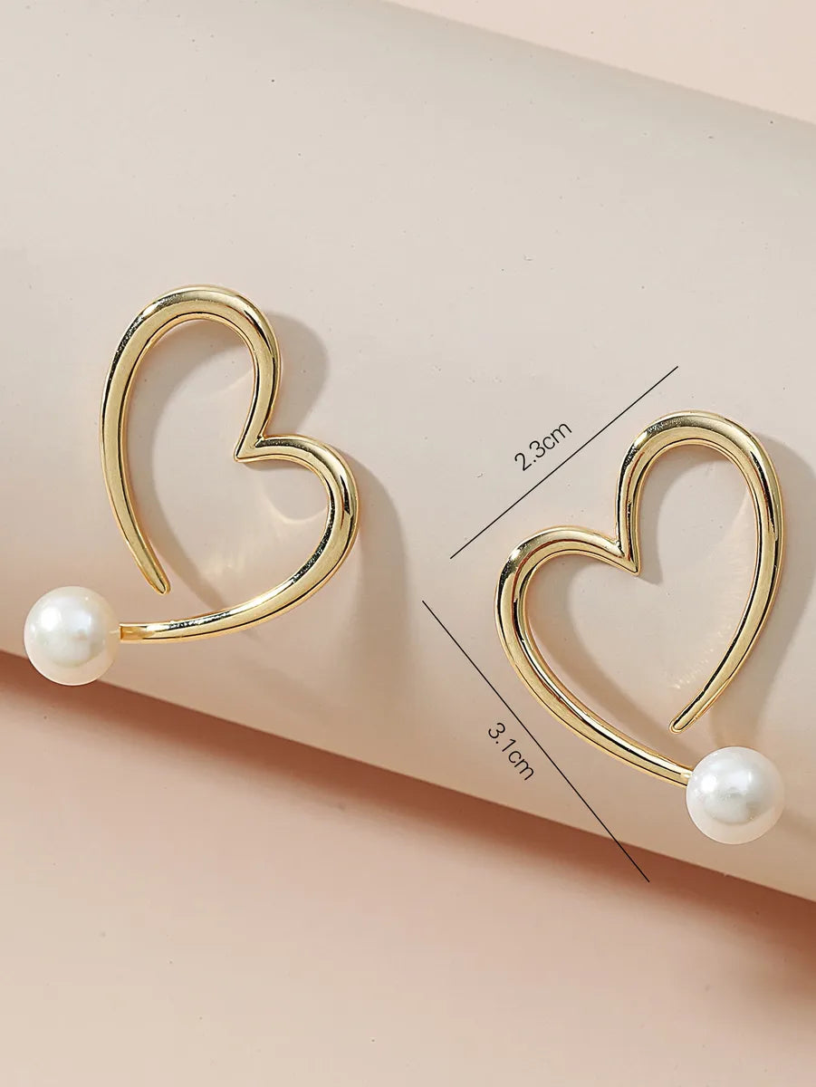 1 Pair Simple Style Heart Shape Hollow Out Inlay Alloy Artificial Pearls Ear Studs