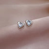 1 Pair Simple Style Heart Shape Titanium Steel Inlay Zircon Ear Studs