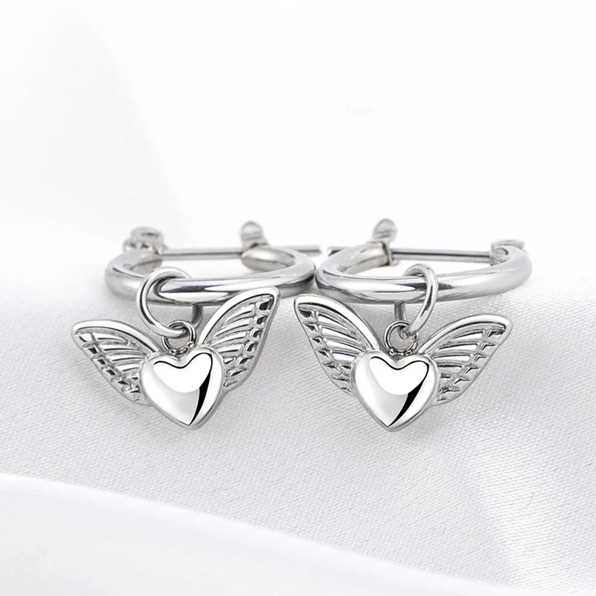 1 Pair Simple Style Heart Shape Wings Polishing Plating Titanium Steel Hoop Earrings