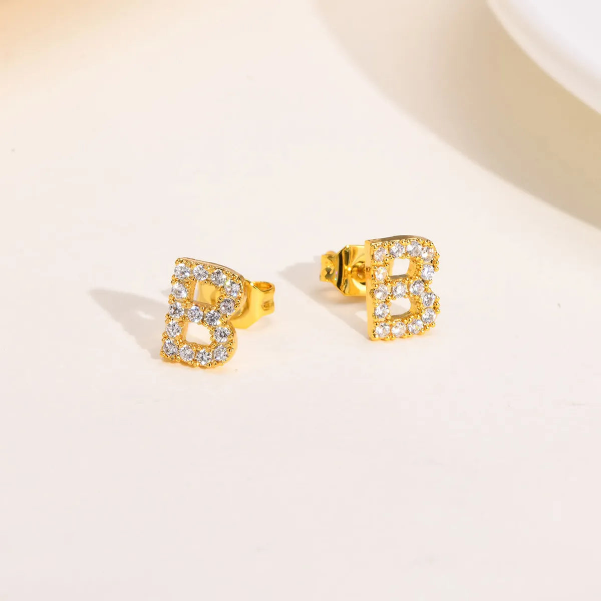 1 Pair Simple Style Letter Inlay Copper Zircon Ear Studs