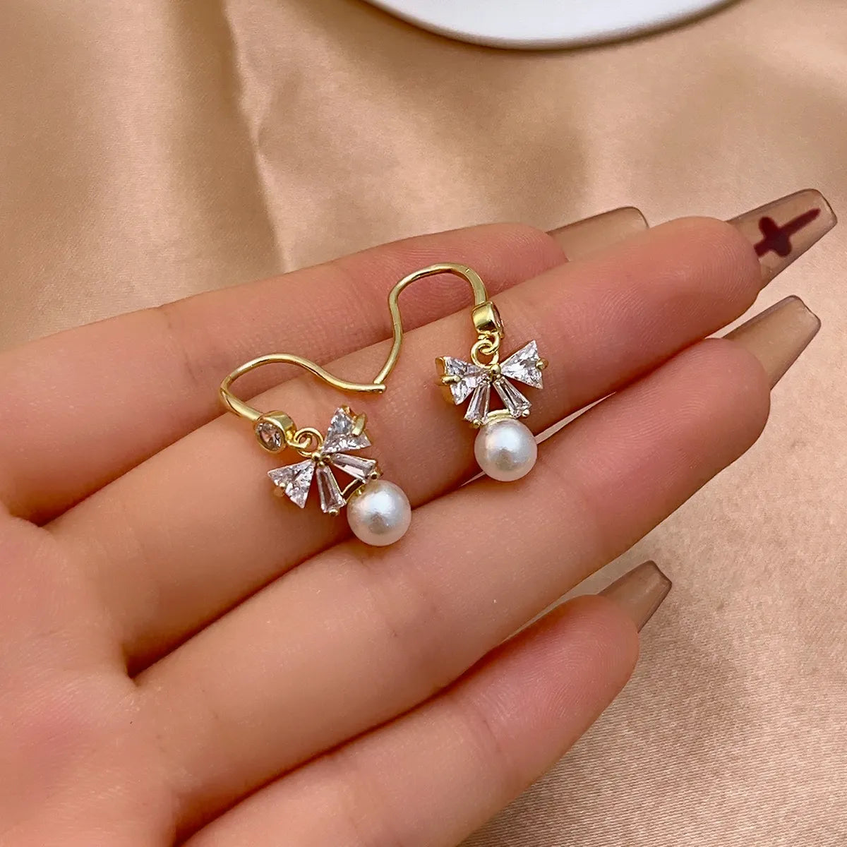 1 Pair Simple Style Shiny Bow Knot Plating Inlay Copper Zircon Gold Plated Drop Earrings