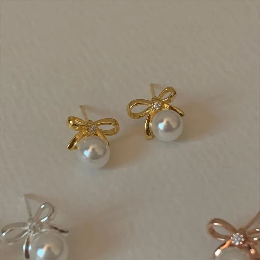 1 Pair Sweet Simple Style Bow Knot Inlay Sterling Silver Pearl Zircon Ear Studs