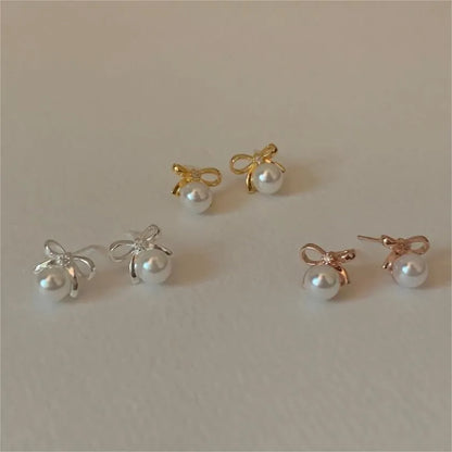 1 Pair Sweet Simple Style Bow Knot Inlay Sterling Silver Pearl Zircon Ear Studs