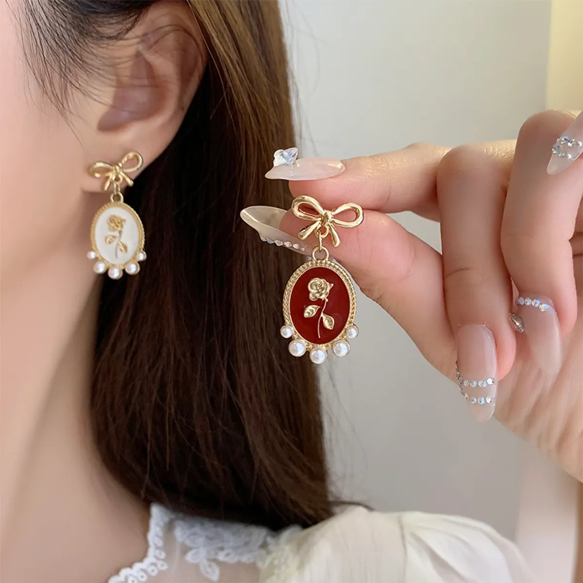 1 Pair Vintage Style Bow Knot Enamel Plating Inlay Alloy Artificial Pearls Gold Plated Drop Earrings