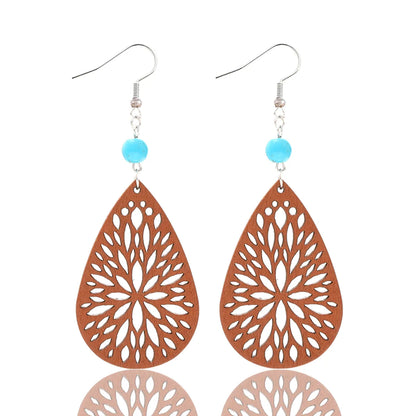 1 Pair Vintage Style Ethnic Style Simple Style Water Droplets Beaded Hollow Out Wood Drop Earrings