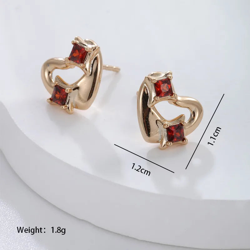 1 Pair Xuping Simple Style Heart Shape Plating Inlay Alloy Copper Alloy Artificial Gemstones 18k Gold Plated Ear Studs