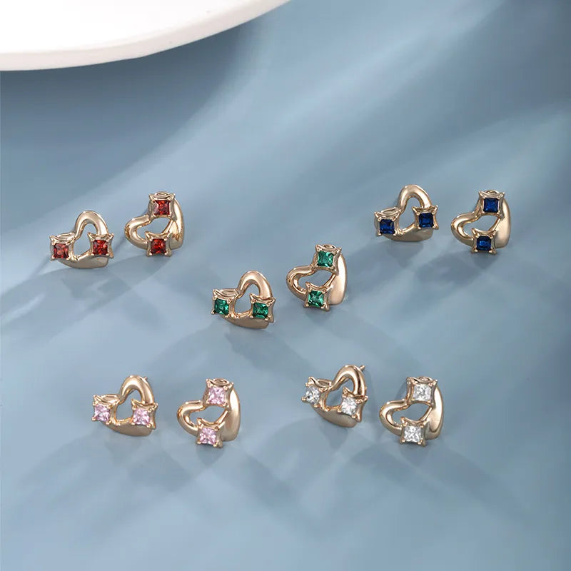 1 Pair Xuping Simple Style Heart Shape Plating Inlay Alloy Copper Alloy Artificial Gemstones 18k Gold Plated Ear Studs