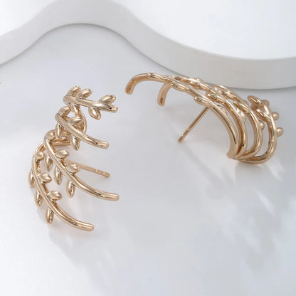 1 Pair Xuping Simple Style Irregular Leaf Asymmetrical Plating Copper Alloy 18k Gold Plated Ear Studs