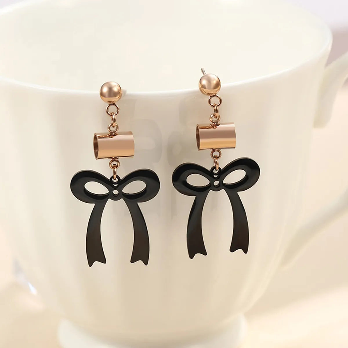 1 Pair XUPING Sweet Bow Knot Irregular Plating 304 Stainless Steel 18K Gold Plated Black Gun Drop Earrings