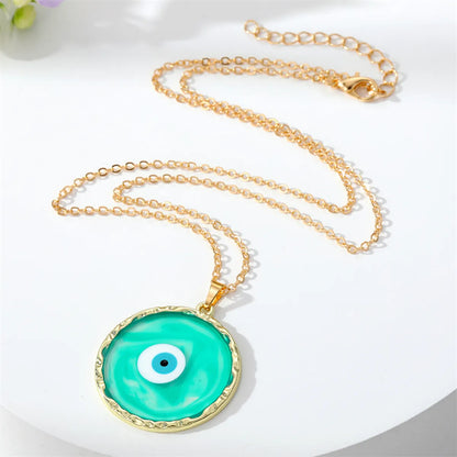 1 Piece Fashion Devil's Eye Metal Plating Transparent Inlay Resin Gold Plated Women's Pendant Necklace