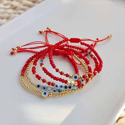 Fashion Eye Artificial Crystal Glass Copper Beaded Enamel Plating Gold Plated Women'S Bracelets