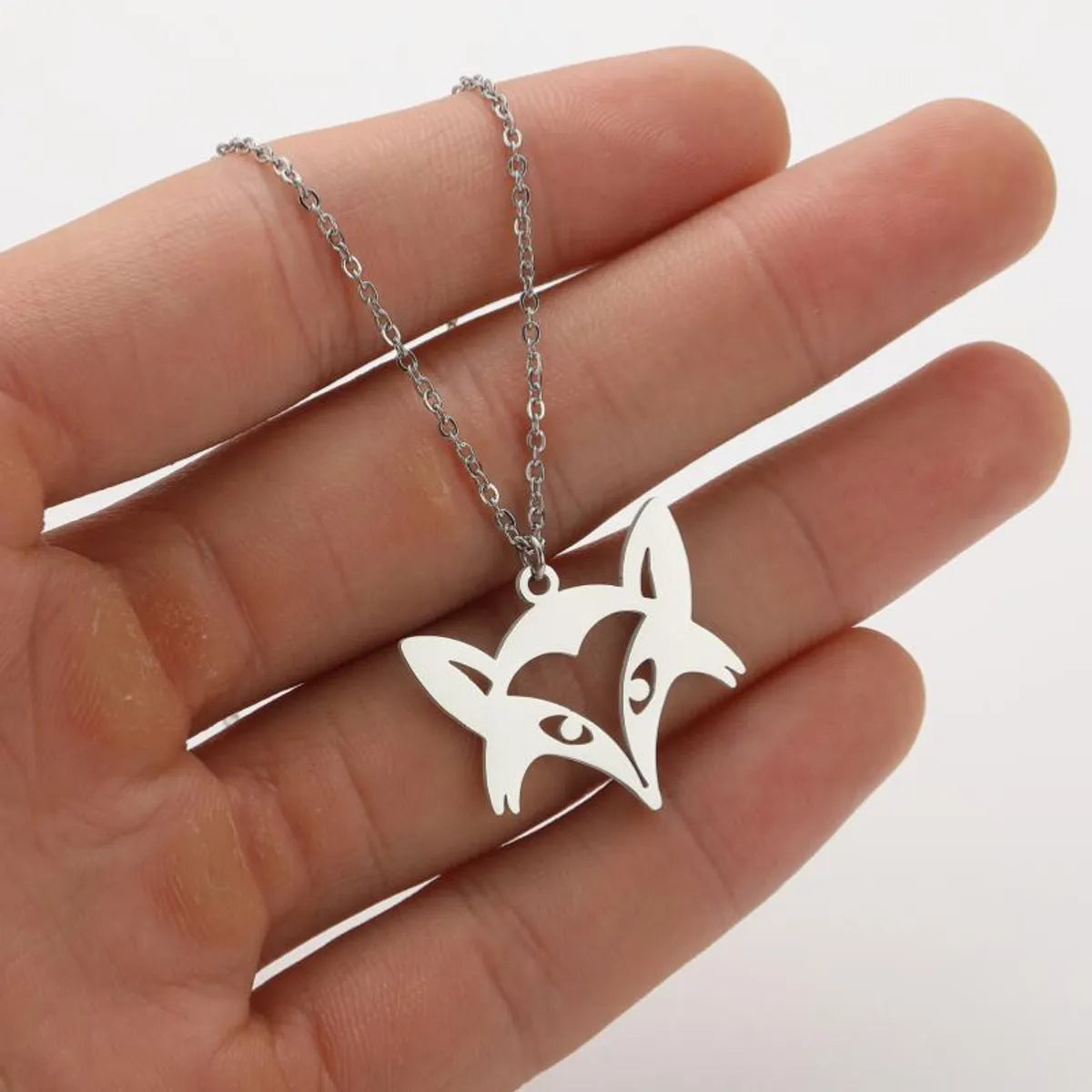 Stainless Steel Titanium Steel Simple Style Hollow Out Animal Pendant Necklace