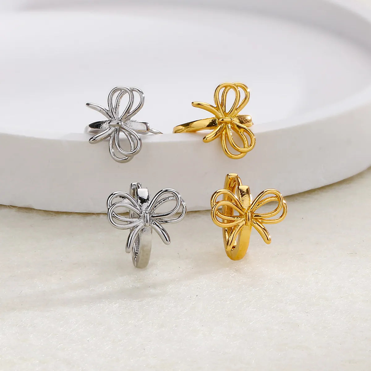 1 Piece Simple Style Bow Knot Plating Hollow Out Copper Gold Plated Earrings