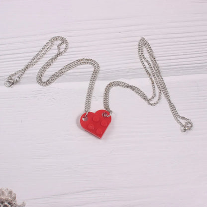 1 Piece Simple Style Heart Shape Alloy Plastic Patchwork Couple Pendant Necklace