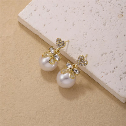 1 Piece Simple Style Heart Shape Bow Knot Plating Inlay Copper Pearl Zircon Gold Plated Ear Studs