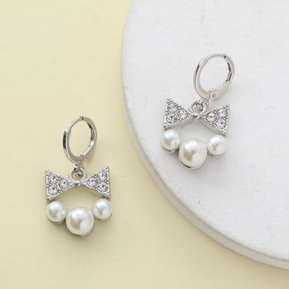 1 Piece Sweet Simple Style Round Letter Bow Knot Hollow Out Inlay Alloy Pearl Zircon Drop Earrings