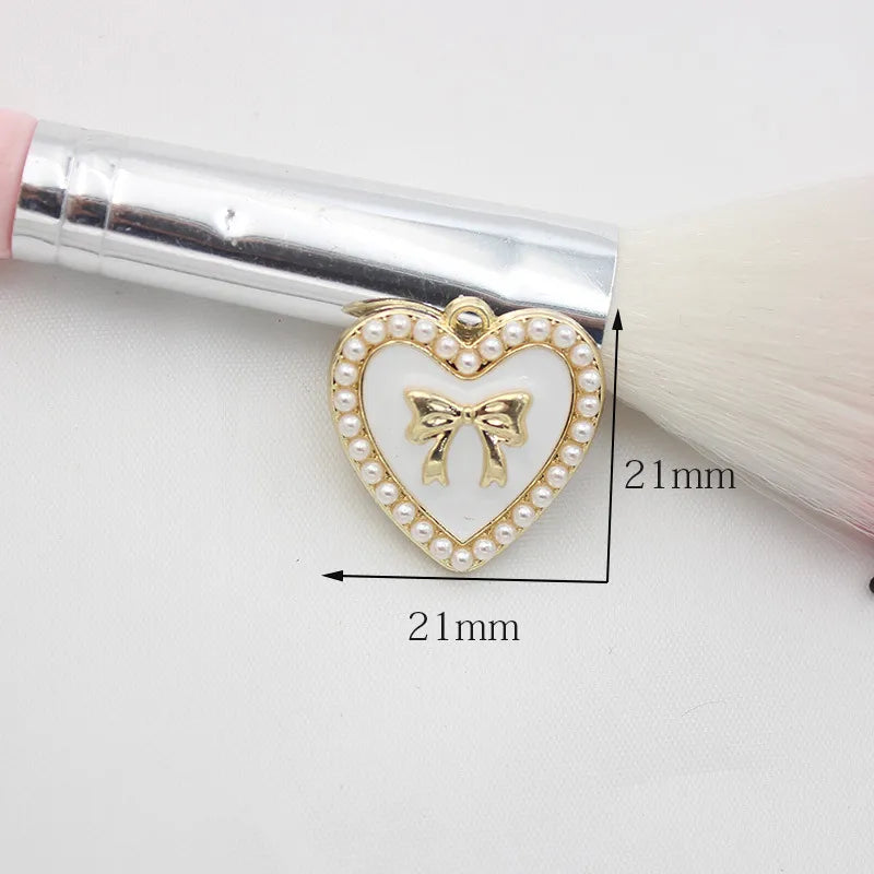 10 PCS/Package 1.5 * 20mm 14 * 14mm 7 * 12mm Alloy Rhinestones Pearl Number Heart Shape Bow Knot Polished Pendant