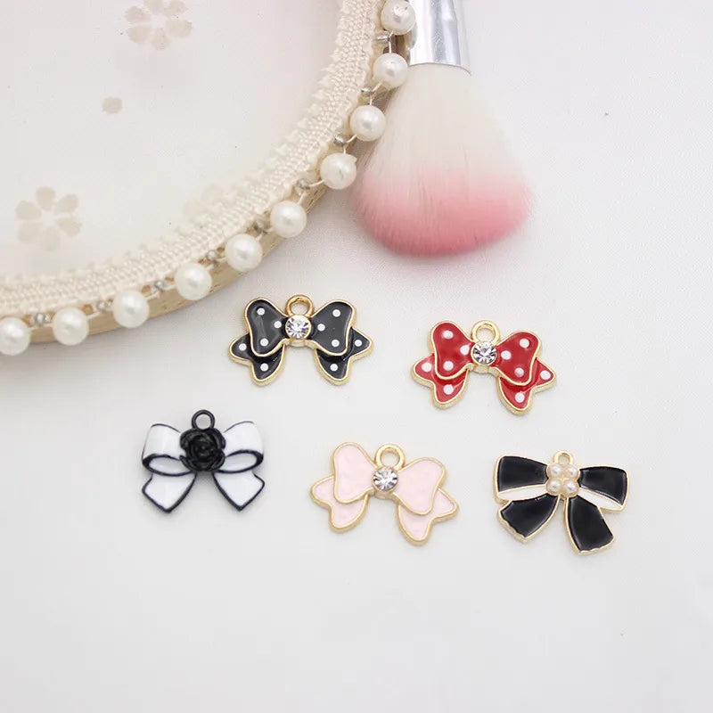 10 PCS/Package 1.5 * 20mm 14 * 14mm 7 * 12mm Alloy Rhinestones Pearl Number Heart Shape Bow Knot Polished Pendant