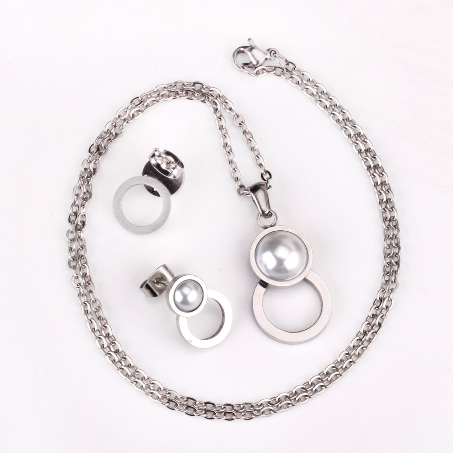 Fashion Geometric Stainless Steel Inlay Artificial Pearls Earrings Necklace 1 Set