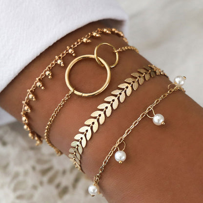 Metal Simple Gold And White Bead Four-piece Combination Bracelet Wholesale