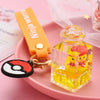 Cute Quicksand Little Yellow Duck Dinosaur Perfume Bottle Acrylic Keychain Wholesale Nihaojewelry