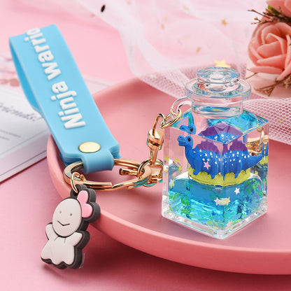 Cute Quicksand Little Yellow Duck Dinosaur Perfume Bottle Acrylic Keychain Wholesale Nihaojewelry