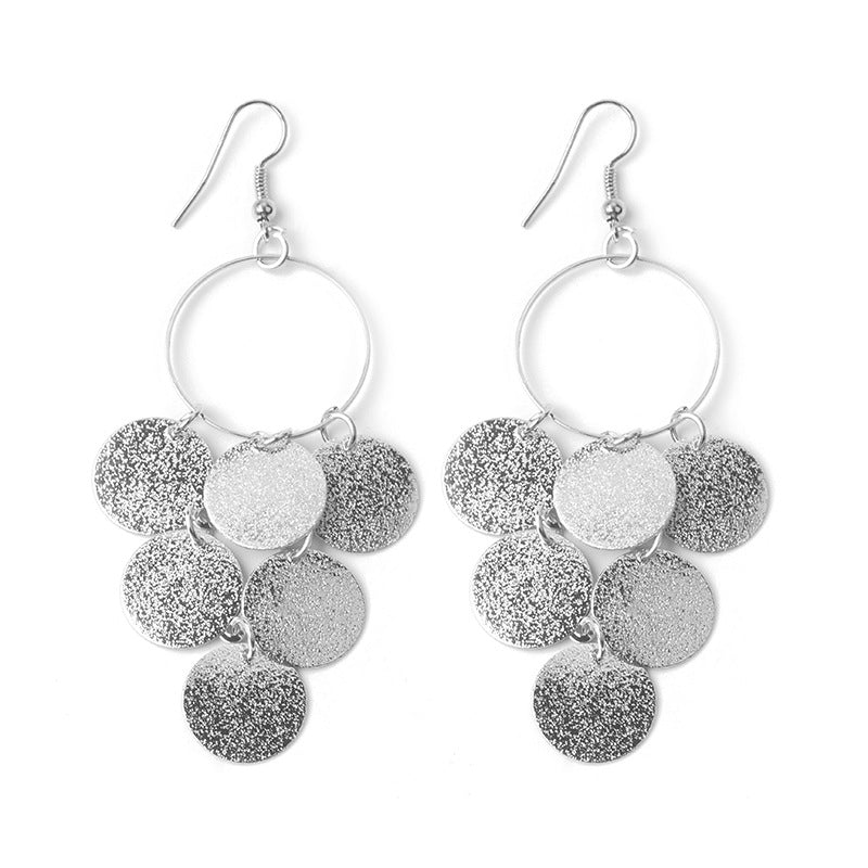 European And American Long Hollow Leaf Heart Frosted Disc Tassel Earrings