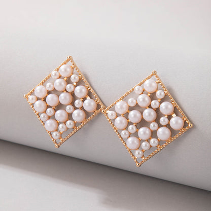 Fashion Pearl Heart-shaped Inlaid Rhinestone Hollow Earrings