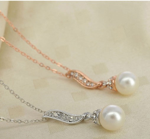 Fashion Rhinestone Angel Wings Pearl Alloy Necklace Ear Stud Two-piece Set