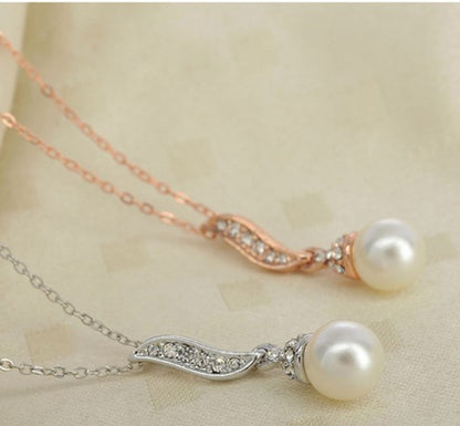 Fashion Rhinestone Angel Wings Pearl Alloy Necklace Ear Stud Two-piece Set