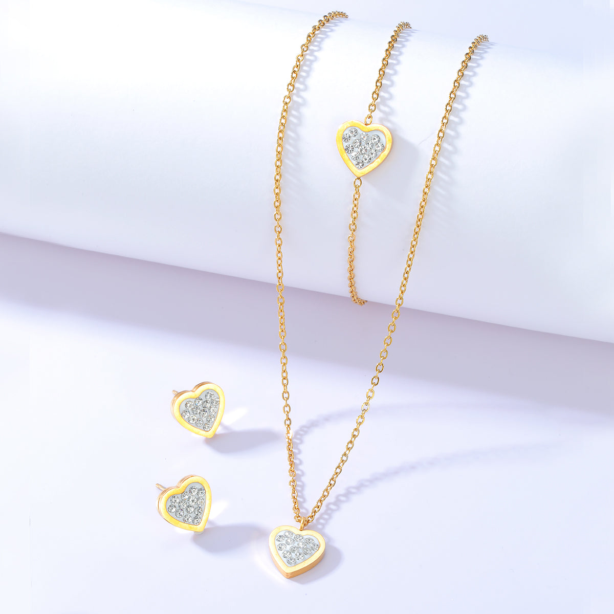 Fashion Simple Heart-shaped Zircon Stainless Steel Ear Stud Bracelet Necklace Set