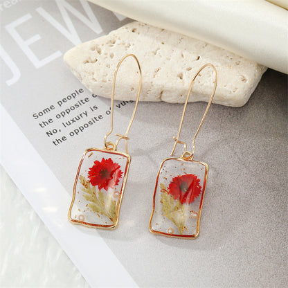 Simple Style Flower Synthetic Resin Alloy Epoxy Transparent Women's Dangling Earrings 1 Pair