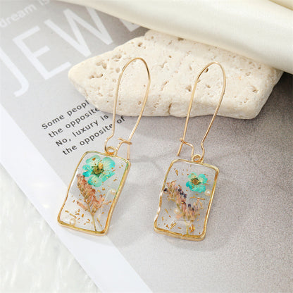 Simple Style Flower Synthetic Resin Alloy Epoxy Transparent Women's Dangling Earrings 1 Pair