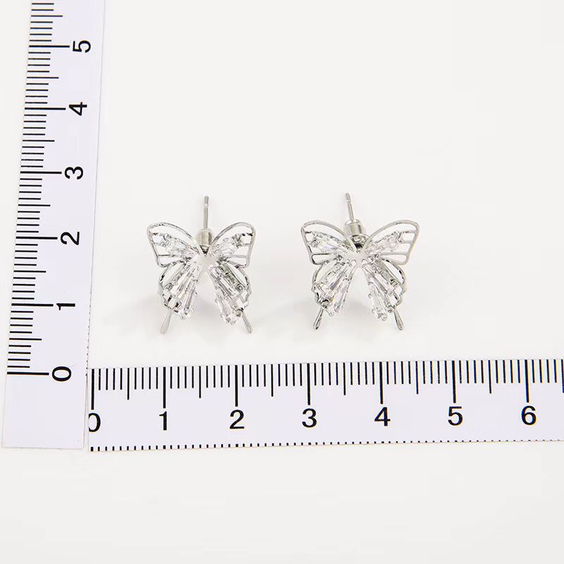 Streetwear Butterfly Alloy Hollow Out Inlay Zircon Women's Ear Studs