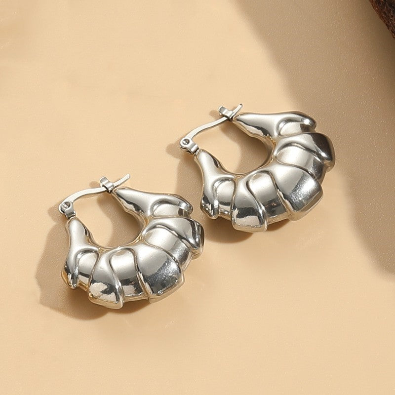 1 Pair Elegant Classic Style Stripe Oval Twist Hollow Out Titanium Steel Earrings