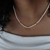 Simple Style Geometric Cross Imitation Pearl Glass Pendant Necklace In Bulk