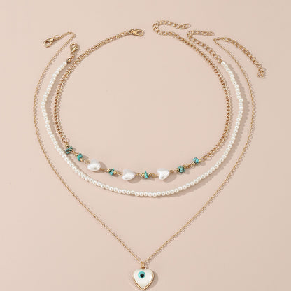 Simple Style Devil's Eye Heart Shape Turquoise Imitation Pearl Alloy Metal Wholesale Necklace