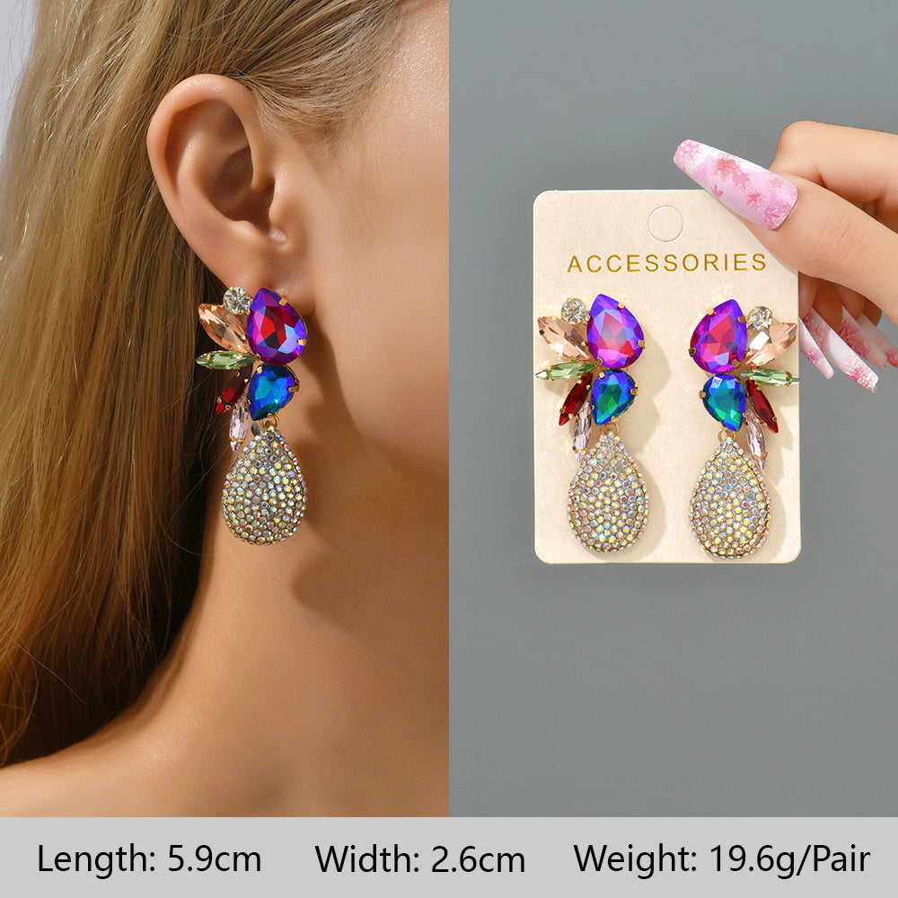 1 Pair Exaggerated Luxurious Shiny Round Heart Shape Wings Plating Inlay Copper Alloy Zinc Alloy Rhinestones Glass Ear Studs