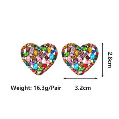 1 Pair Exaggerated Luxurious Shiny Round Heart Shape Wings Plating Inlay Copper Alloy Zinc Alloy Rhinestones Glass Ear Studs