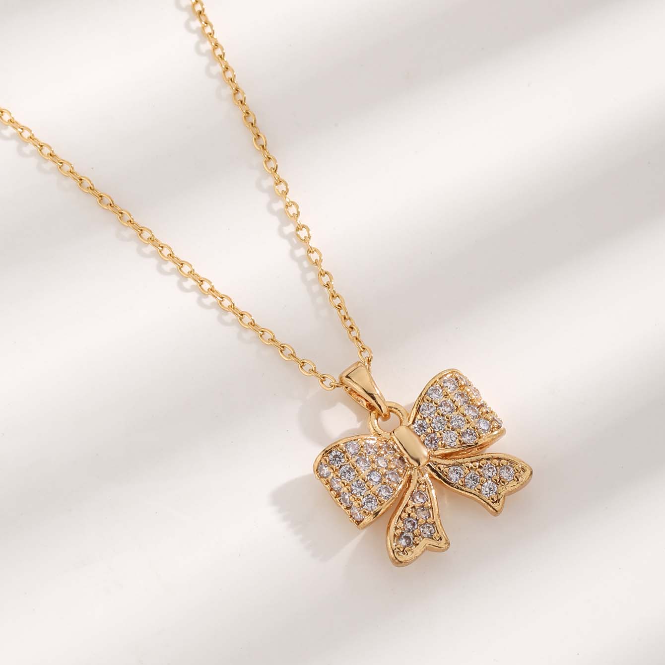 Simple Style Bow Knot Titanium Steel Plating Inlay Zircon Gold Plated Pendant Necklace