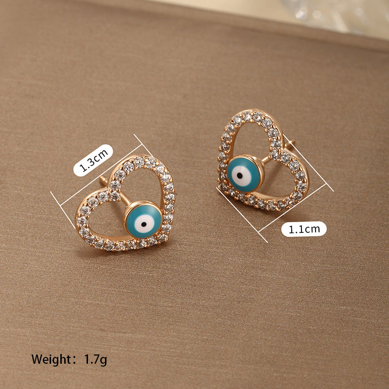 1 Pair Retro Xuping Devil's Eye Plating Inlay Alloy Copper Alloy Artificial Gemstones 18k Gold Plated Ear Studs