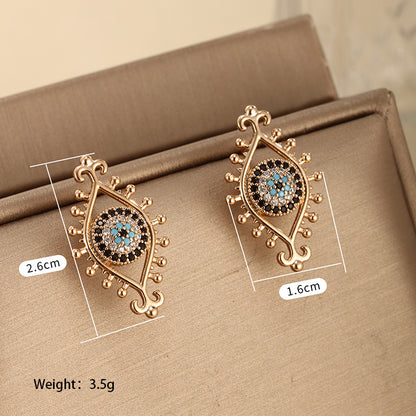 1 Pair Retro Xuping Devil's Eye Plating Inlay Alloy Copper Alloy Artificial Gemstones 18k Gold Plated Ear Studs