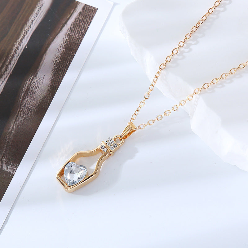 Simple Style Heart Shape Bottle Alloy Plating Inlay Artificial Crystal Women'S Pendant Necklace