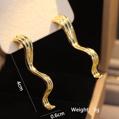 1 Pair Ig Style Glam Exaggerated Irregular Solid Color Spiral Plating Hollow Out Metal Copper 18k Gold Plated Drop Earrings Ear Studs