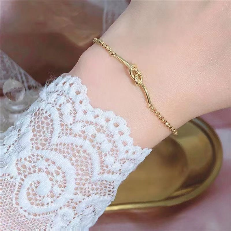 Casual Elegant Simple Style Solid Color Knot Copper Plating Gold Plated Bracelets