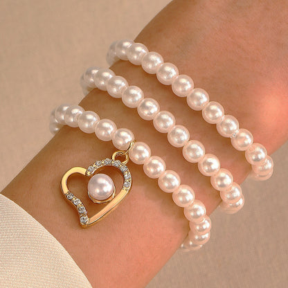 Simple Style Commute Heart Shape Artificial Pearl Alloy Beaded Inlay Zircon Women's Bracelets